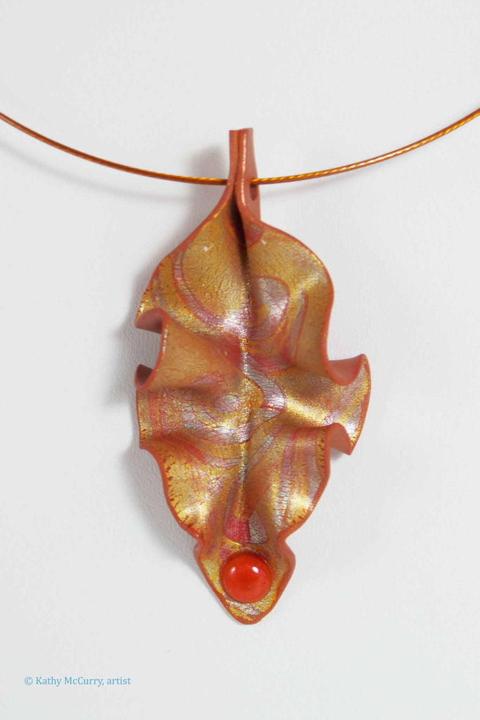 Antique Gold with Rosy Silver Swirl and Rust Cab